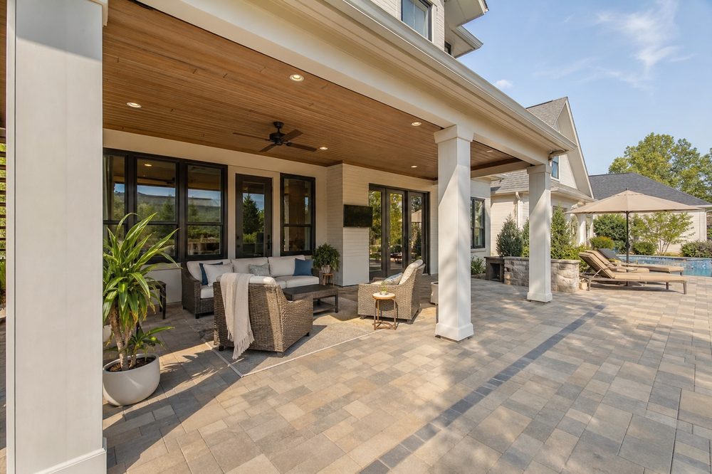 Clean paver patio and covered porch after residential pressure washing