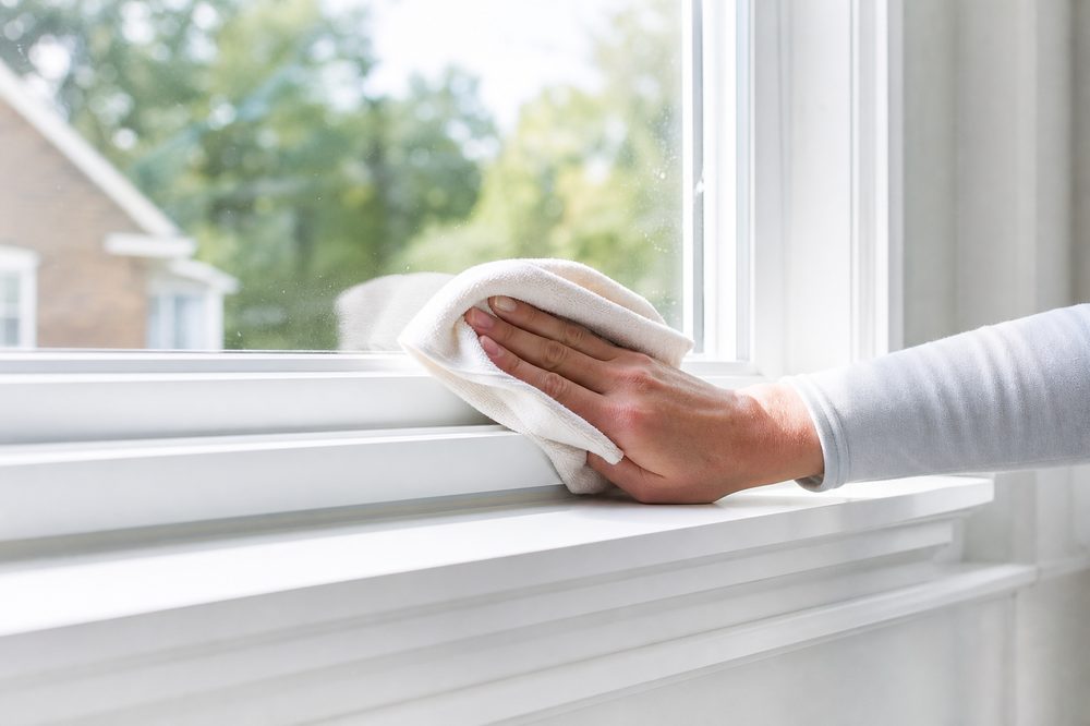 Clean window frame and sill wiped free of dust and water spots Clean window frame and sill wiped free of dust and water spots